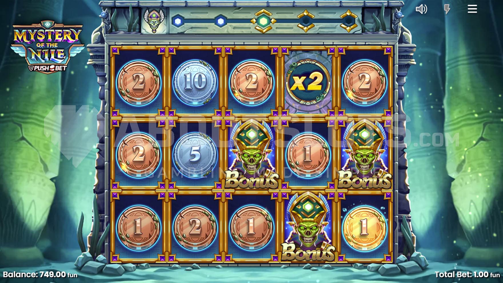 Pharaoh Reveal feature in progress, occupying all 5 reels with multiple instant prizes, an x2 multiplier and 3 Bonus Symbols.