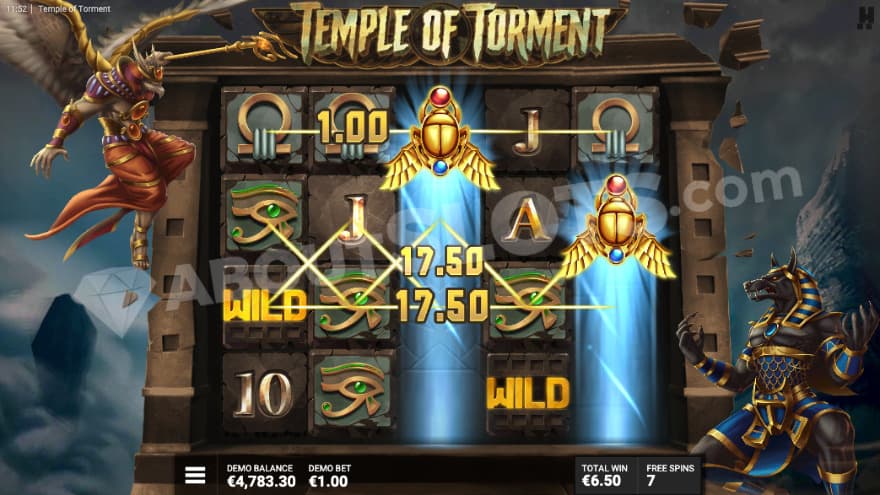 Anguish of Anubis bonus game with wild golden scarab symbols.