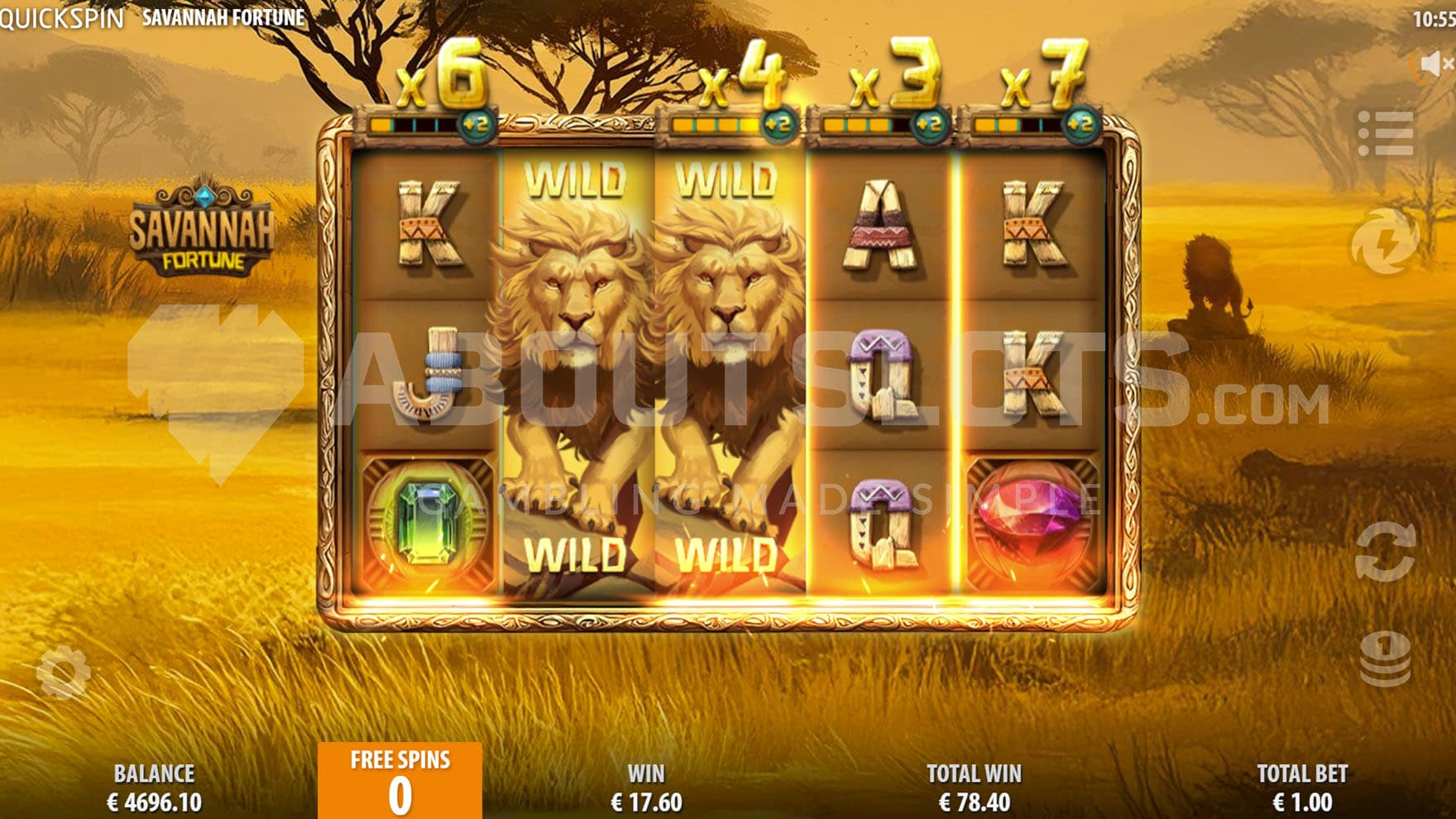 Free Spins bonus in progress, showing several reels with increased multipliers and two Expanding Wilds on reels 2 and 3.