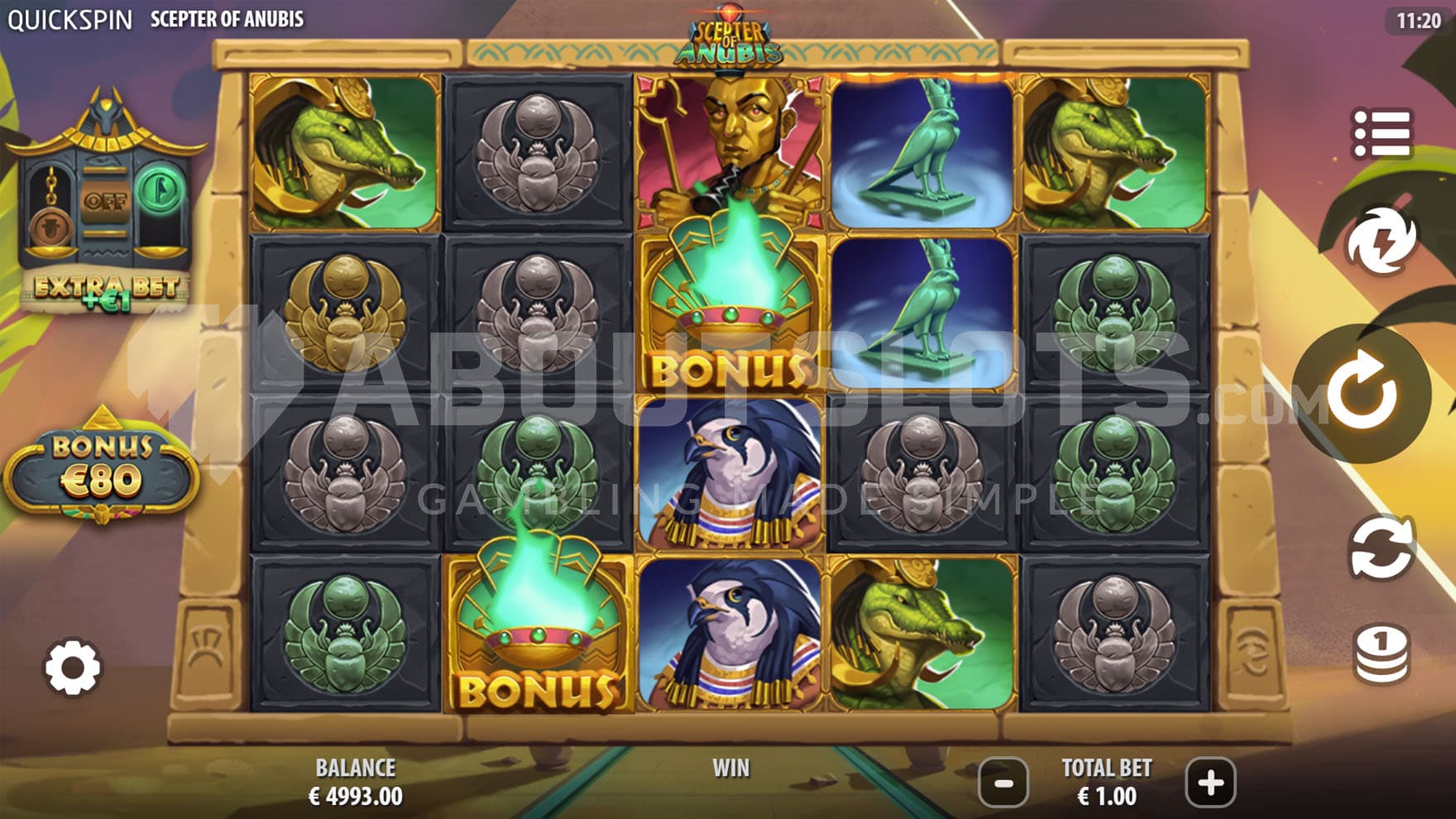 Base Game view of a 5x4 grid on a backdrop of a pyramid, with a mix of high, low-paying and special symbols on the reels.