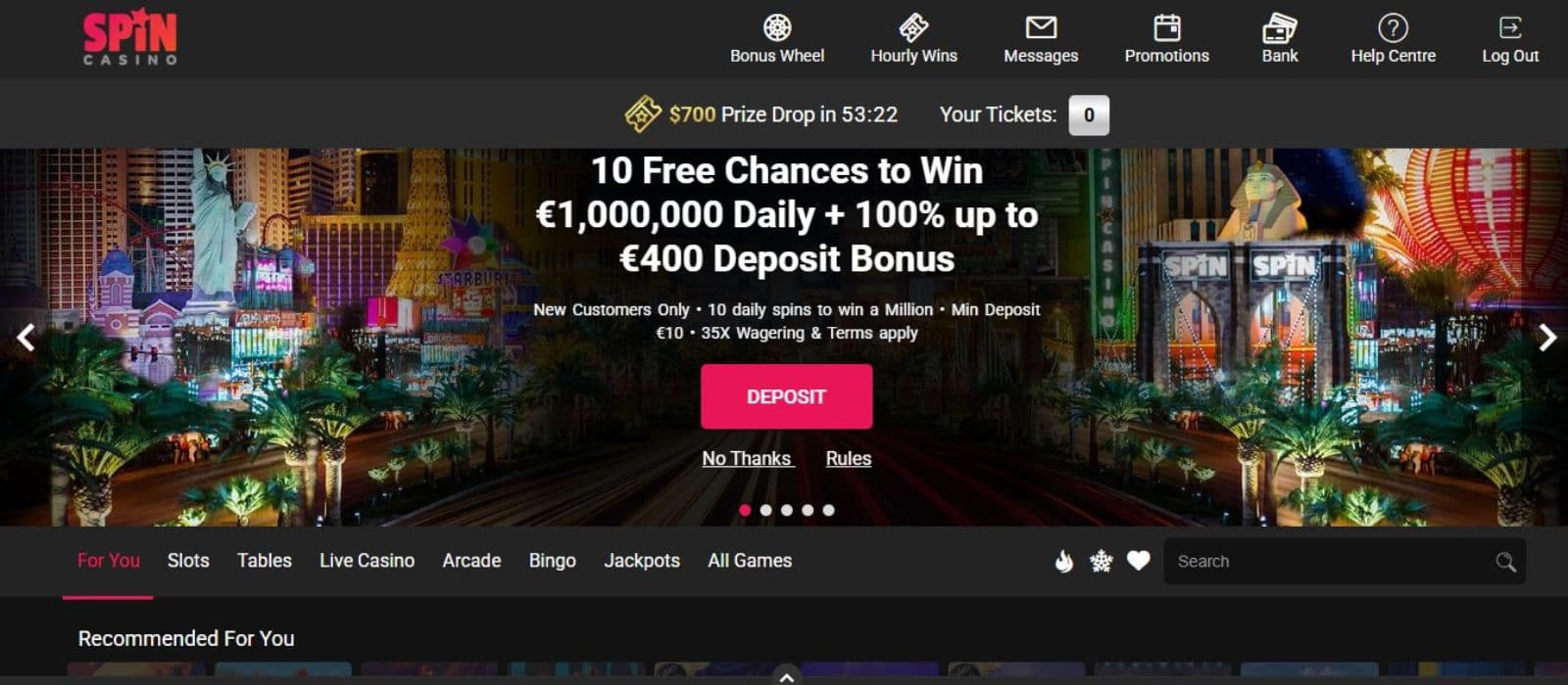 Spin Casino's homepage, showing the welcome bonus and horizontal menu.