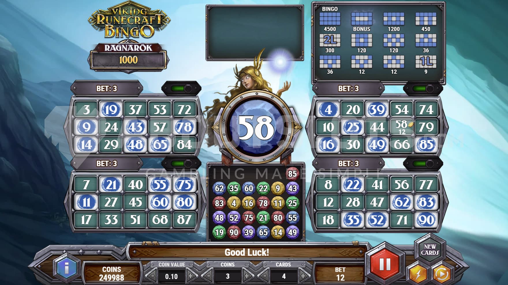 Base Game view of a bingo game with 4 cards played simultaneously, on a backdrop of dark mountains.