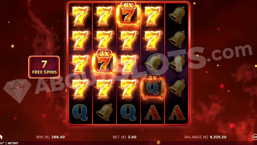A total of 14 burning 7s on the expanded 5x5 free spins grid.