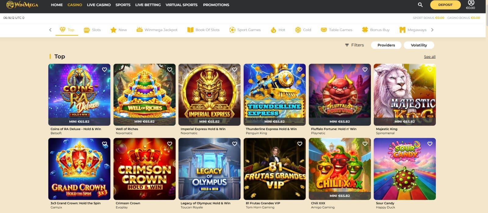 WinMega casino's game page shows the top games, including Coins of RA Deluxe, Well of Riches, and more.