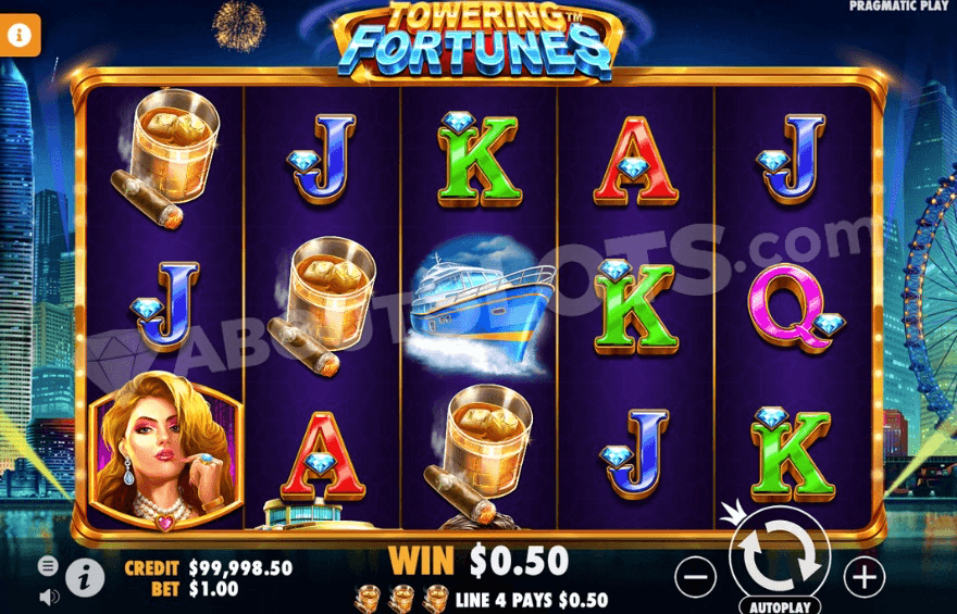 Grid of Towering Fortunes slot with spinning reels and an amusement park in the background.