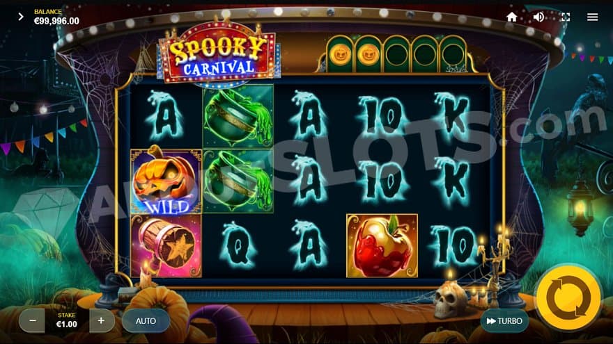 A casino slot on a stage with spooky decoration.